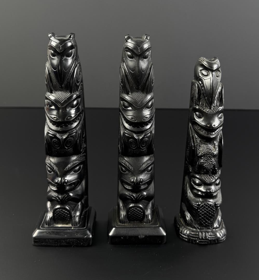 Collection of Northwest Coast Resin Totem Poles: Nice grouping.