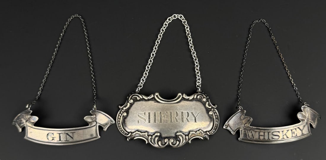 Sterling Silver Whiskey Gin Sherry Bottle Labels: Largest is 3 5/8" by 2 3/4". 30.34 grams.