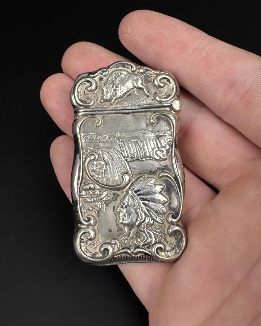Niagara Falls Sterling Silver Match Vesta Safe: Features an Indian Chief, Buffalo and Niagara Falls. 2 3/8" by 1 1/4". 13.85 grams.