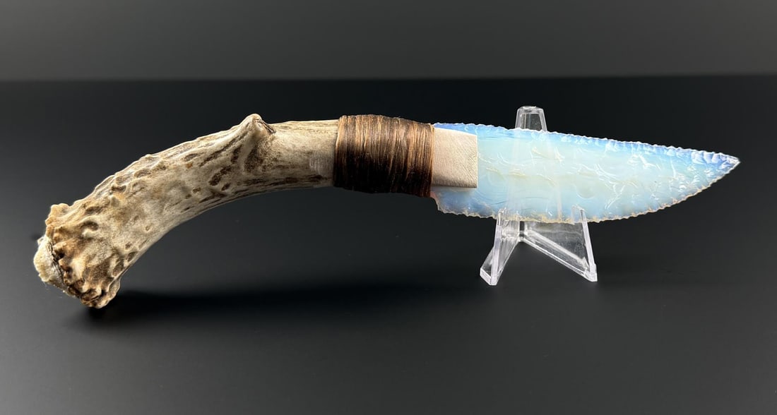 Bo Earls Handmade Antler Handle Opalite Knife: Handmade by Bo Earls. Bo is one of the finest modern flint and obsidian knappers. His knives are some of the nicest money can buy. The handle is whitetail deer horn. 9 1/2" long.