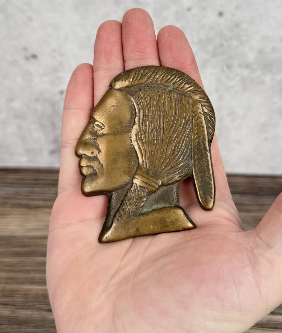 Jennings Chief Slot Machine Indian Head Emblem: 3 1/8" by 2 5/8". Nice original example.