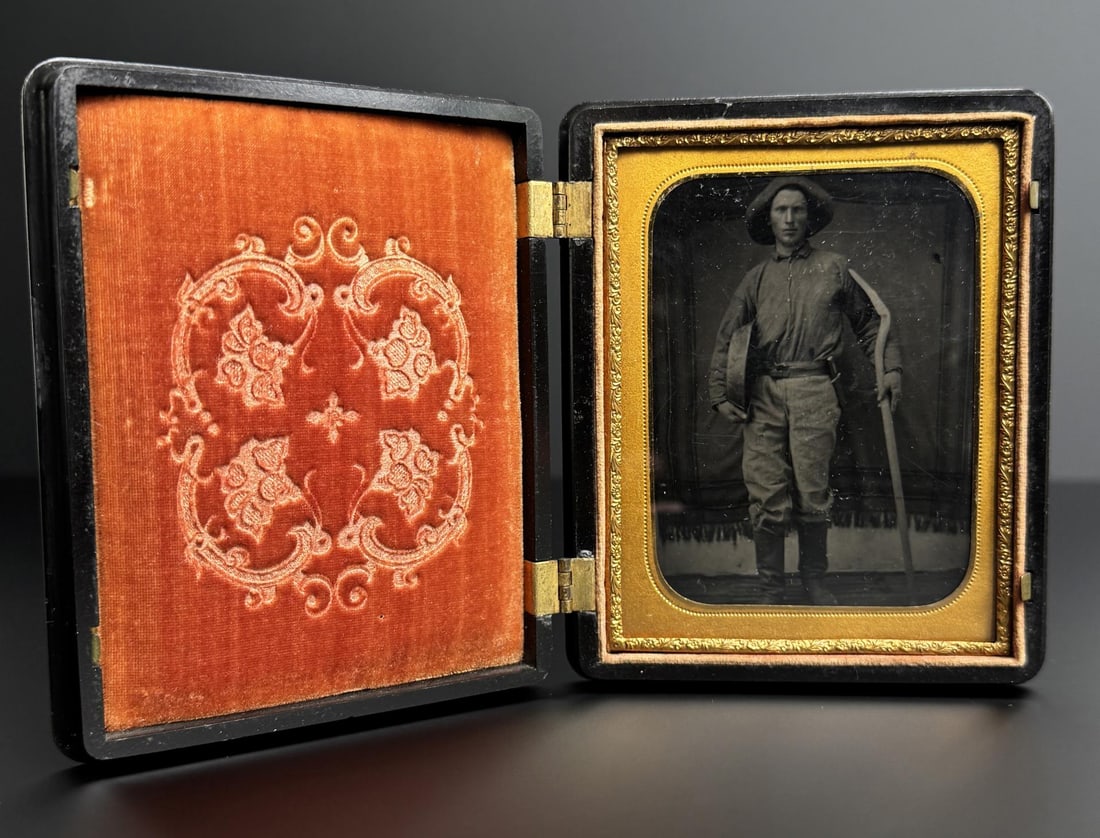 1849 California Gold Rush Miner Tintype Photo: Absolutely outstanding image. Features one of the first California Gold Miners. He is sporting denim jeans, a gold pan, a bowie knife, and a shovel. Quarter Plate Size. 4" by 5" in thermoplastic