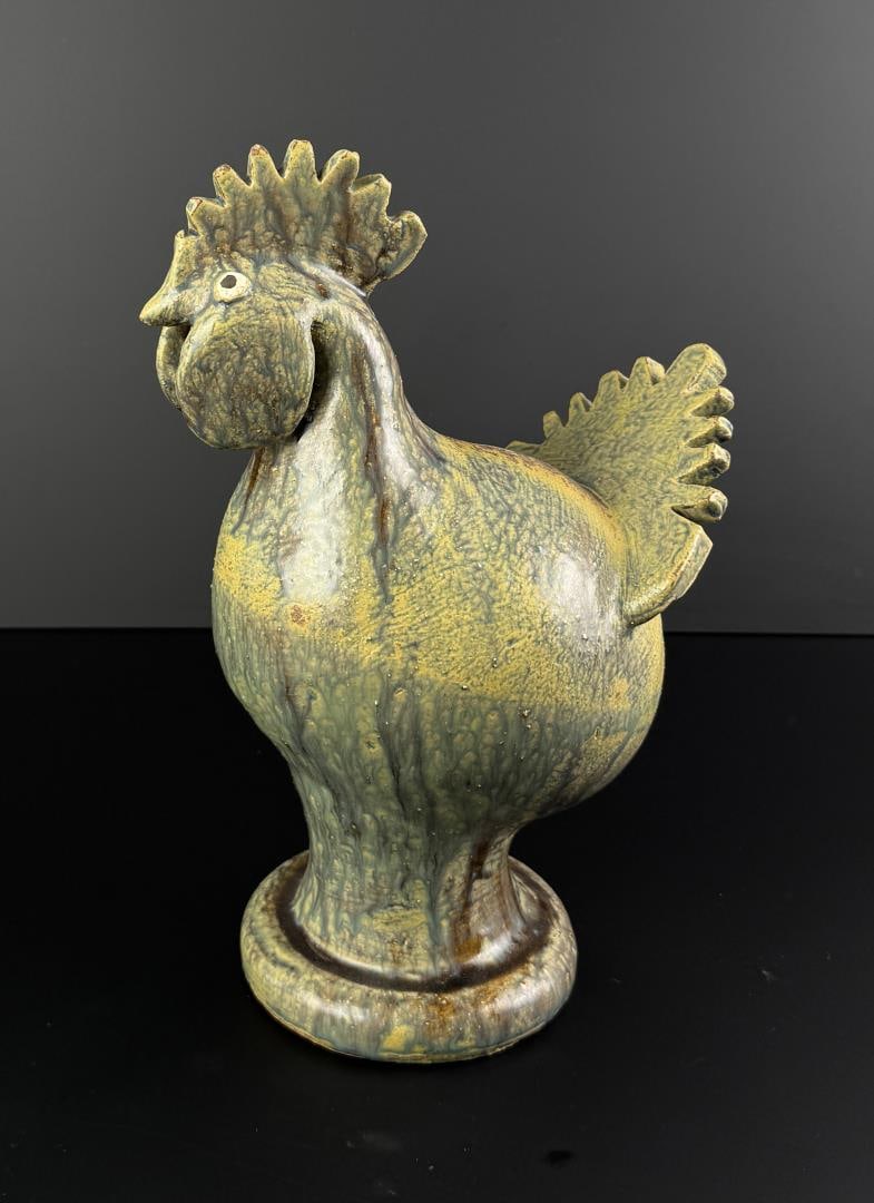 Reggie Meaders Folk Art Pottery Rooster: 12 1/4" by 7 3/8" by 6 3/4". Reggie Meaders (1916 - 2009) was active/lived in Georgia. Reggie Meaders is known for Sculpture face jugs.