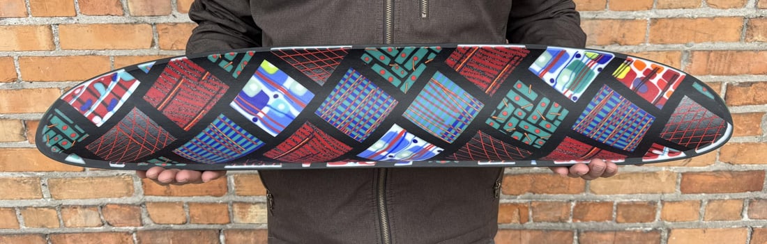 Martin Kremer Fused Glass Mosiac Ellipse Bowl: 34 1/4" long by 6 1/2" wide. Artist statement I was a stained glass enthusiast while pursuing a career in medical technology and the glass won, first as a spare-time business and then as a full-time o