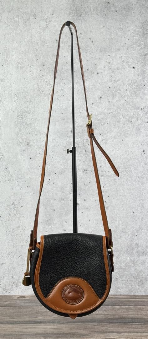 Vintage Dooney & Bourke Leather Purse: 9 1/8" by 7 7/8" by 3" without strap.