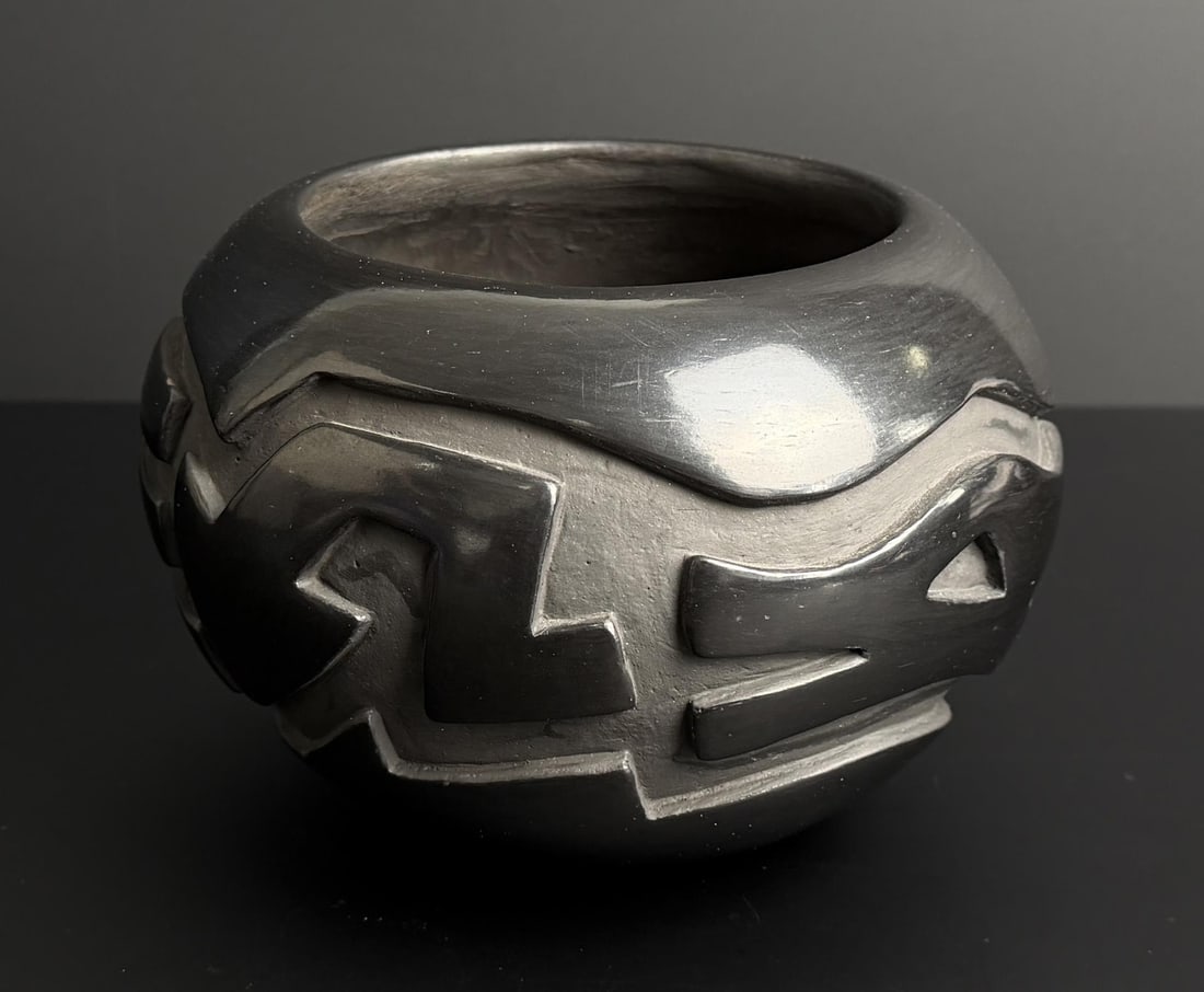 Edward Samaniego Santa Clara Pueblo Jar: 7" by 7" by 4 7/8". Santa Clara, New Mexico. 12/88.