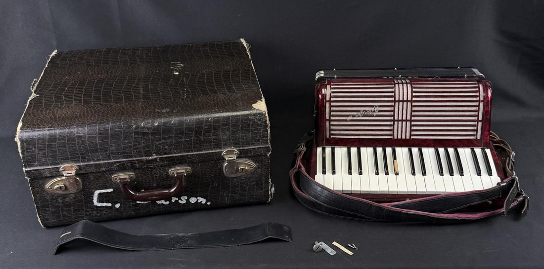 Hohner Tango Accordion: Missing part of emblem. Owned by Charles Leroy Larson of Stevensville Montana. In working order.