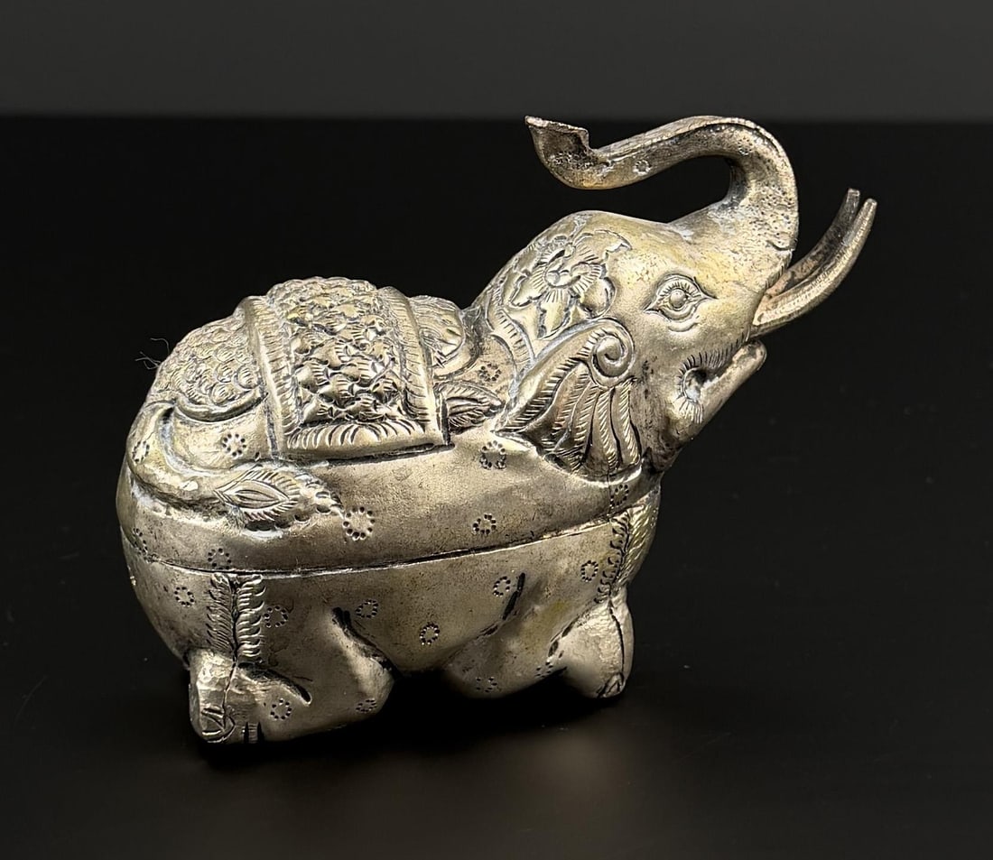 Cambodian Elephant Betel Nut Box: Stamped 900 but does not test for silver. 132 grams. 2" by 3 3/8" by 4 5/8".