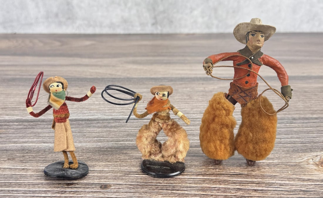 Anna Luara Cowboy Cowgirl Dolls: Cowgirl is 3 3/8" tall, tall cowboy in wooly chaps is 4 7/8" tall.
