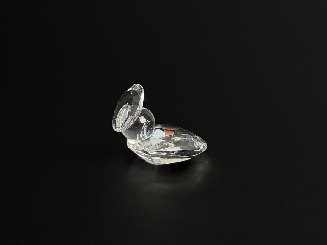 Swarovski Crystal Baby Jesus Figurine: 1/2" long, 1/4" tall. From the Nativity scene.