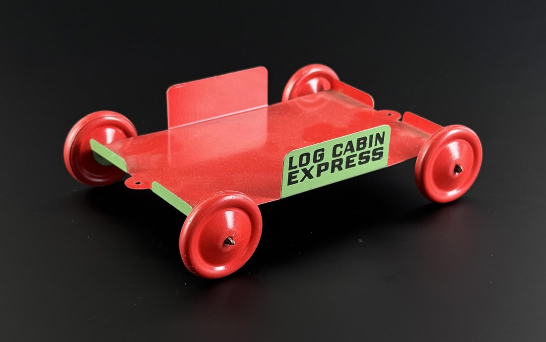 Log Cabin Express Syrup Tin Pull Toy: 5 1/2" by 4 1/8" by 1 1/2".