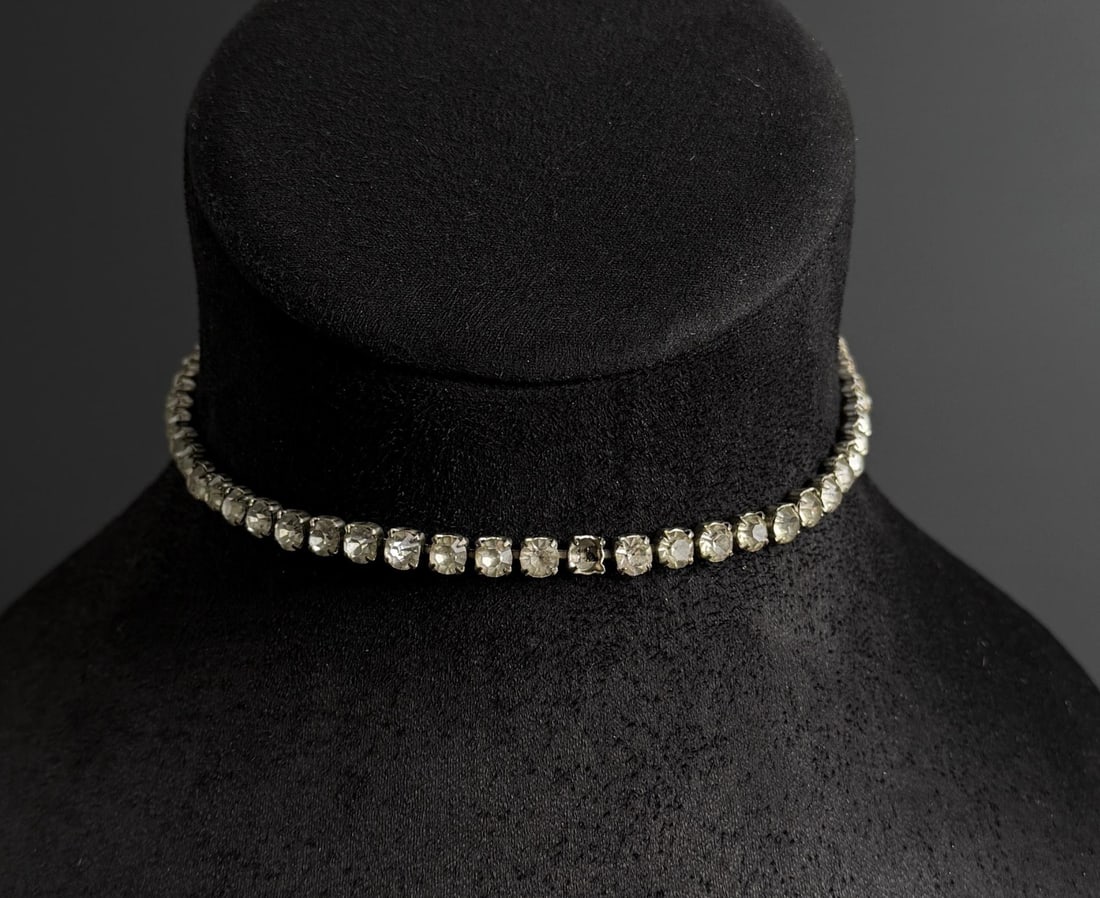 Sterling Silver Rhinestone Necklace: 7" long closed. 19.56 grams. Missing one rhinestone.