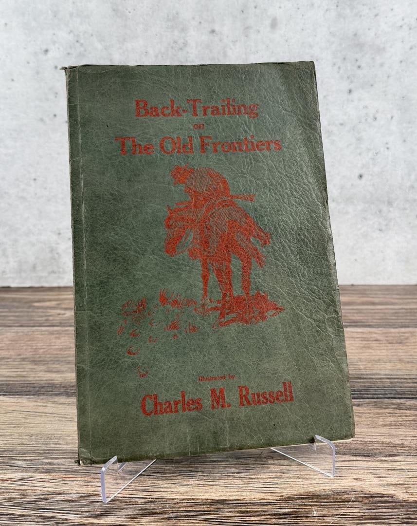 Back Trailing on The Old Frontiers First Edition: Illustrated by Charles M. Russell. 1922. From the Native American reference library of Stanley Miller.