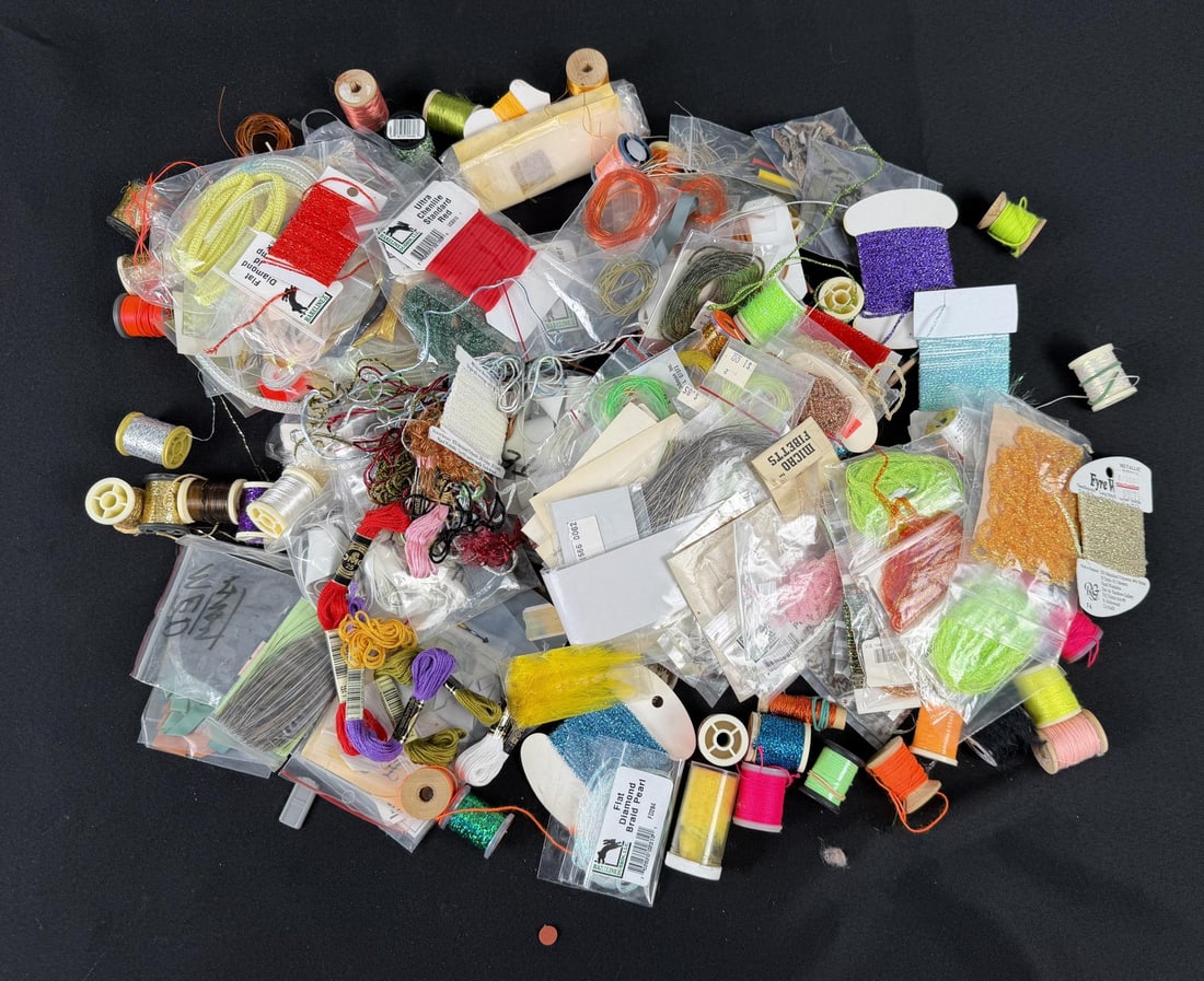 Large Group of Fly Fishing Fly Tying Supplies: Group consists of mostly streaming synthetic materials.