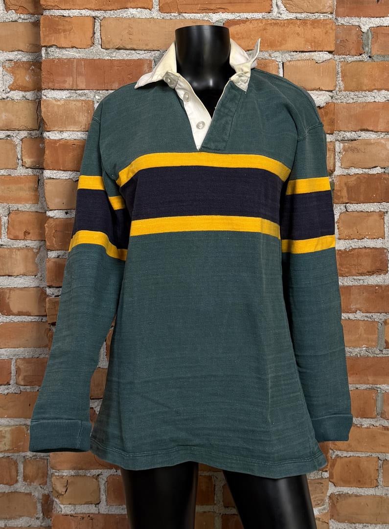 Vintage Patagonia Rugby Shirt: Size tag has been ripped out, likely fits a men's medium, refer to measurements. Shoulder to shoulder: 18" Chest: 19" Total length: 27"