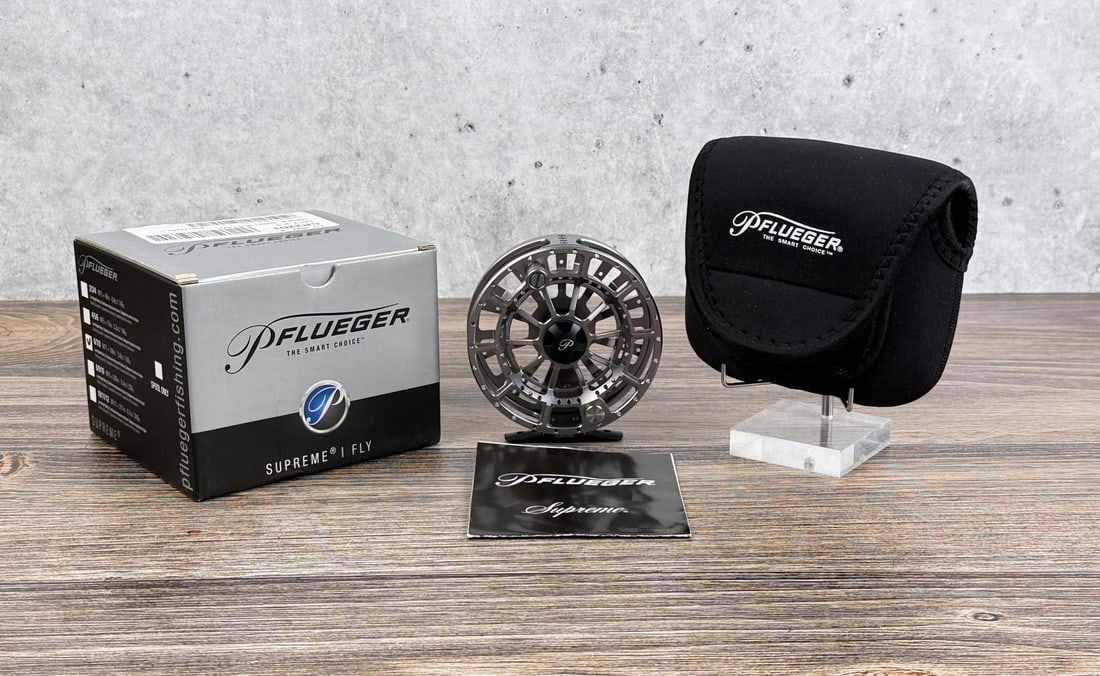 Pflueger Supreme Fly Fishing Reel: Comes with the box, protective case, and manual.