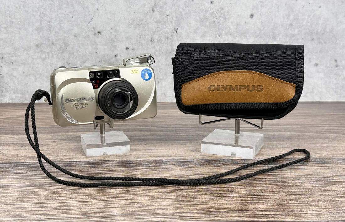 Olympus Stylus Zoom 140 35mm Film Camera: Camera is in working condition.