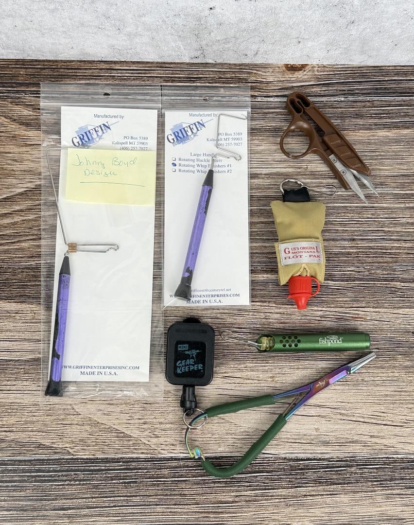Fly Tying Fly Fishing Tools Griffin: Includes Griffin rotating hackle pliers, whip finishers, a fishpond tool, a gear keeper, and a Gus's original flot-pak.