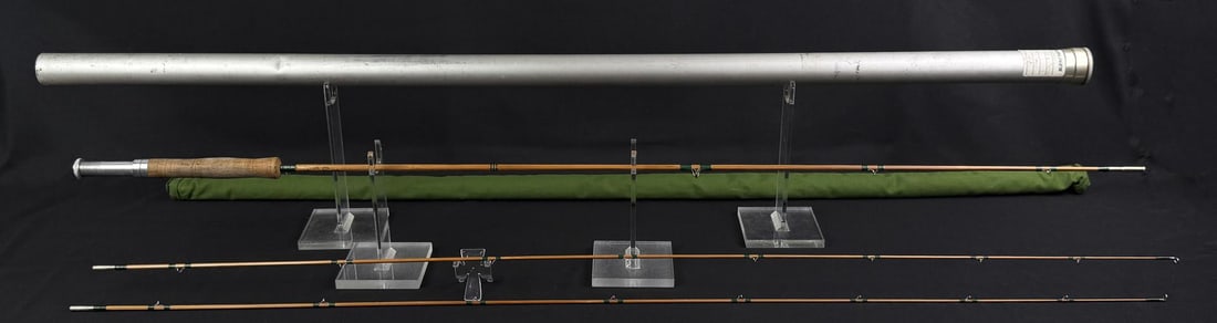 The Walton Powell Custom Bamboo Fly Fishing Rod: 8' long, 2 piece. Includes two tips. and a travel sleeve and case