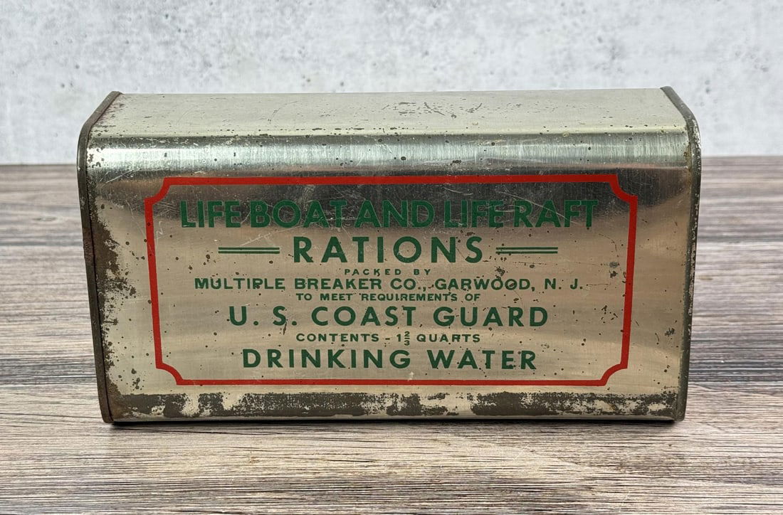 US Coast Guard Lifeboat Drinking Water Ration: Contains 1 2/3 quarts of drinking water. Packed by Multiple Breaker Co., Garwood, N.J.
