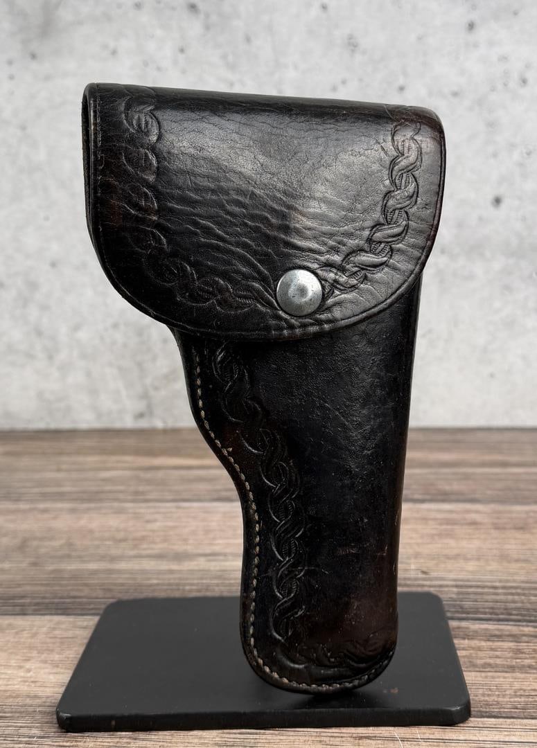 George Lawrence Co Pistol Holster: 8" by 7 7/8" by 1 7/8". Made by George Lawrence Co, Portland, OR. Model 32A.