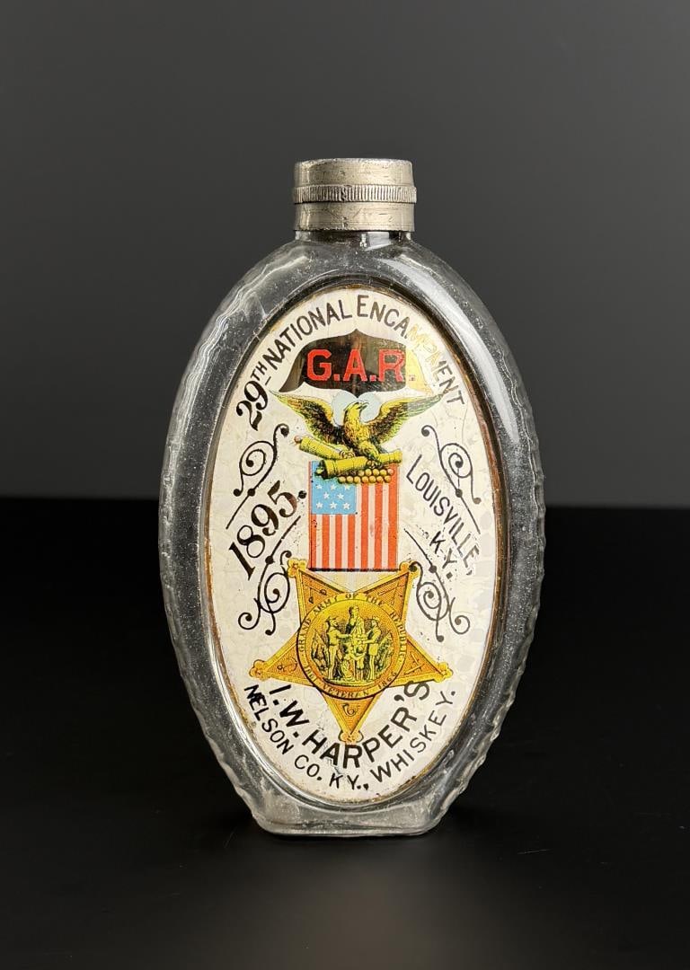 1895 GAR Encampment Label Under Glass Flask: 29th National Encampment. 1895, Louisville Kentucky. I.W. Harper's Whiskey. 5 7/8" tall.
