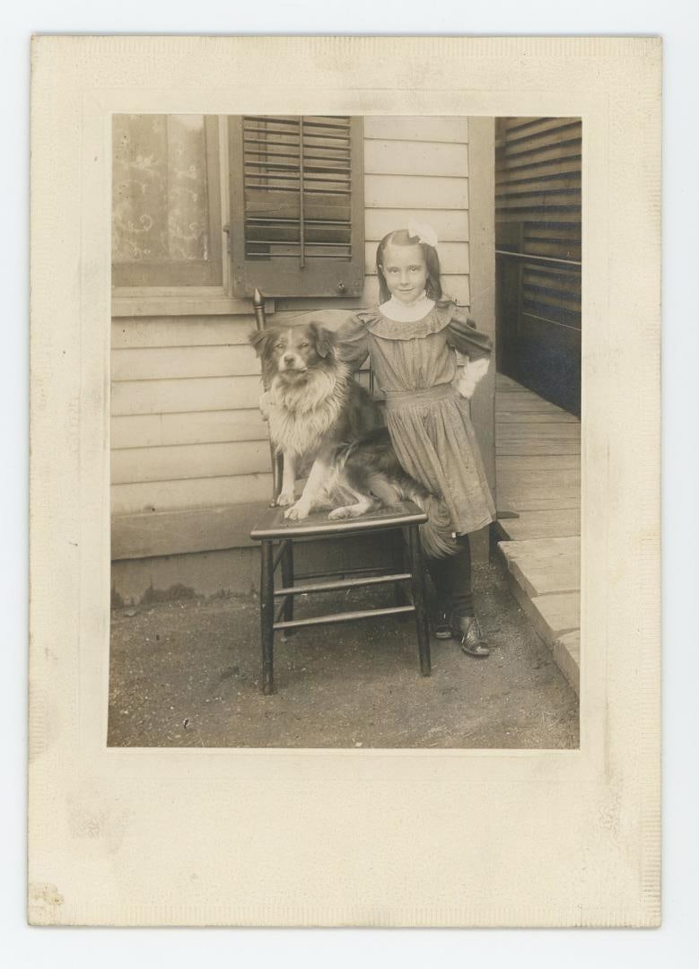 Girl with Pet Dog Cabinet Photo (1 of 3)