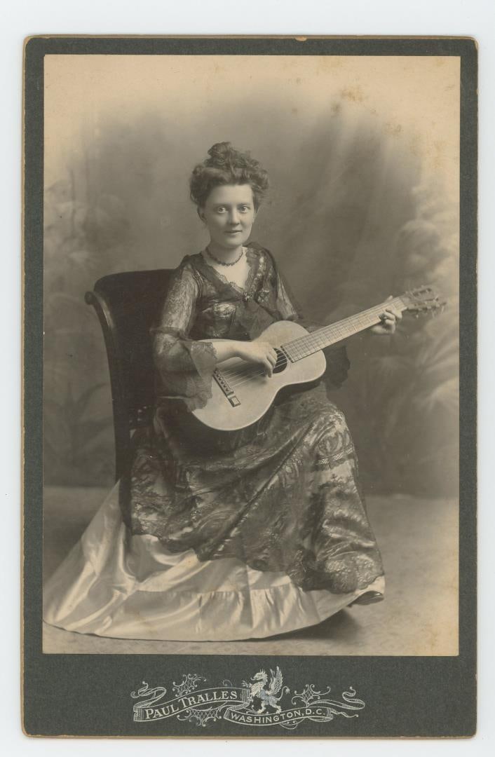 Occupational Female Guitar Player Cabinet Photo (1 of 3)