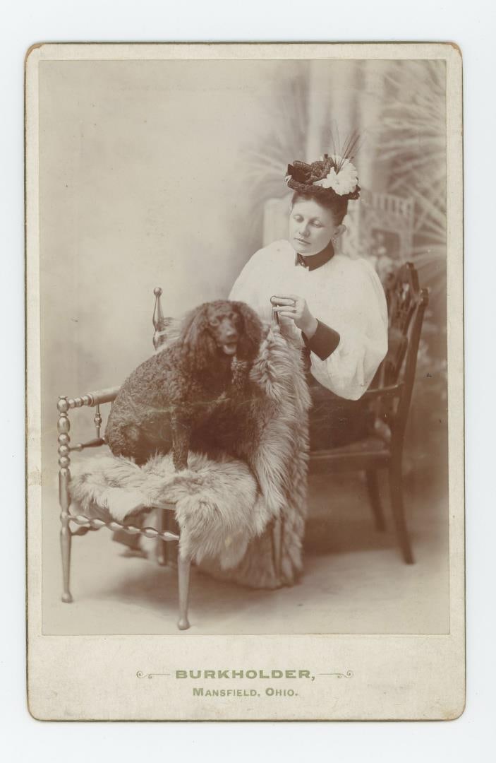 Woman with Poodle Dog Cabinet Photo (1 of 3)