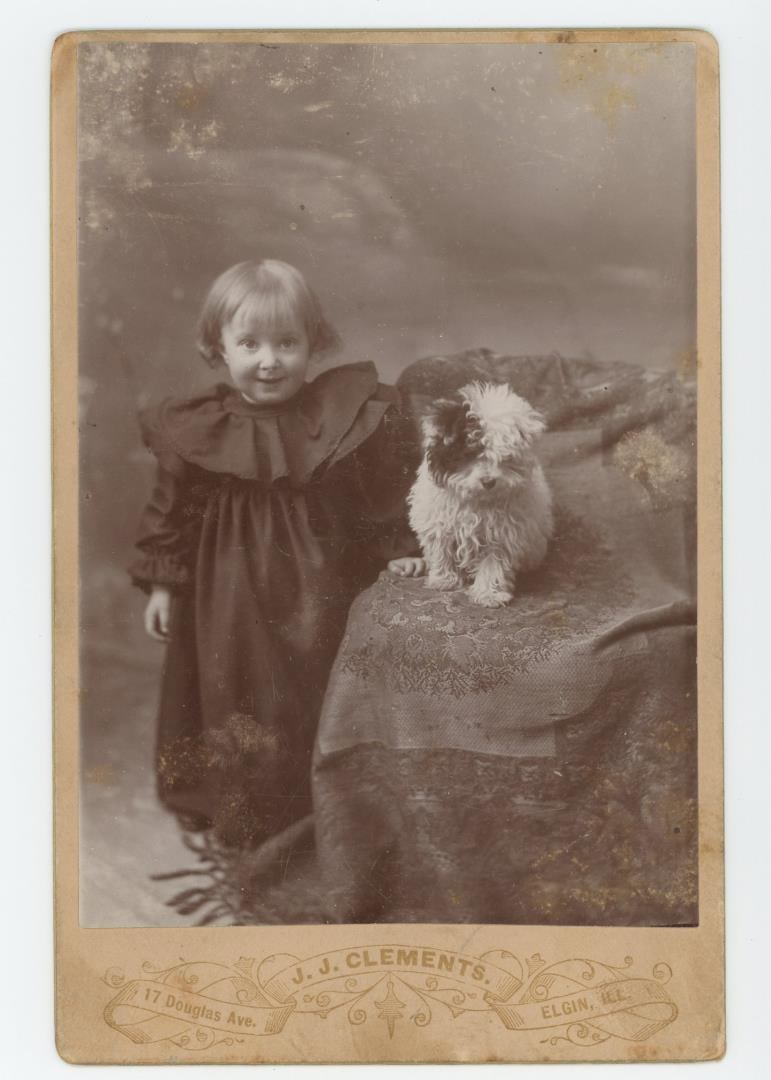 Child with Pet Dog Cabinet Photo (1 of 3)