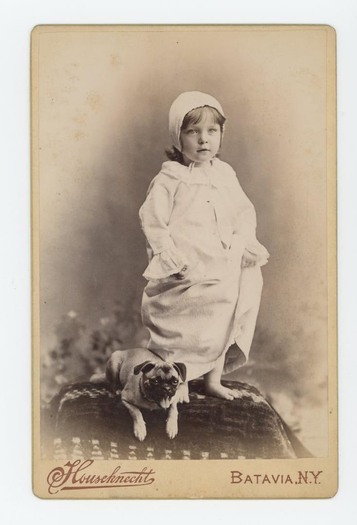 Child with Pet Dog Cabinet Photo (1 of 3)