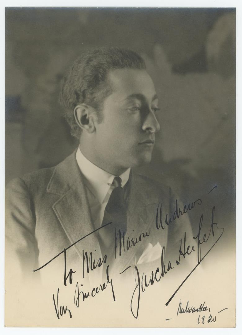 Jascha Heifetz Soviet Violinist Signed Photo: 6 1/4" by 9". Inscribed to Miss Marion Andrews. Jascha Heifetz (February 2 1901 - December 10, 1987) was a Russian-American violinist, widely regarded as one of the greatest violinists of all time. Bo