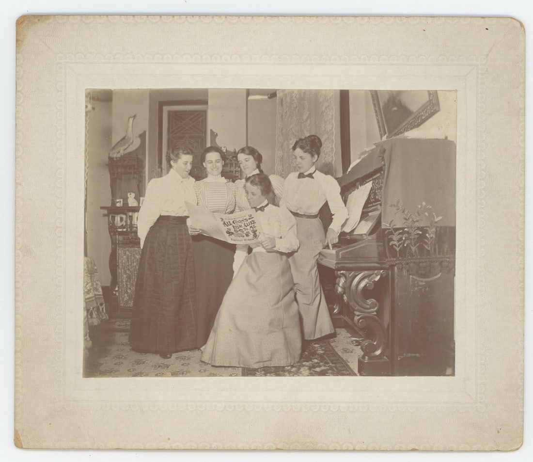 Women Reading Black Minstrel Sheet Music Photo: 6 1/2" by 5 1/2". Women are reading All Coons Look Alike to Me.