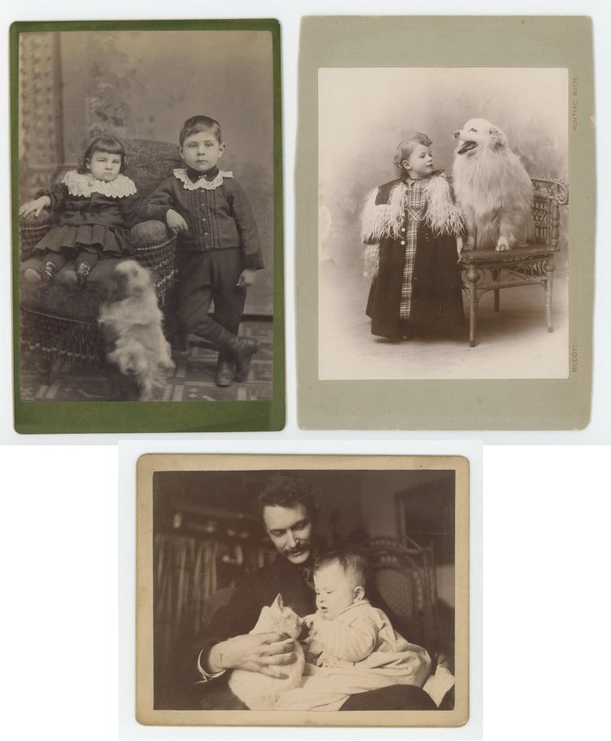Children with Pet Dogs and Cats Cabinet Photos: Nice grouping, both dogs and cats are shown with their owners.