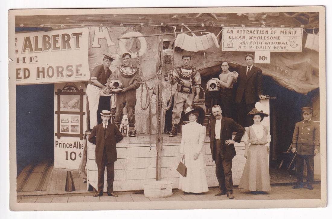 Alaska Yukon Pacific Exposition RPPC Postcard: Nice example. Shows the Prince Albert, the Educated Horse show and an octopus prop in the center.