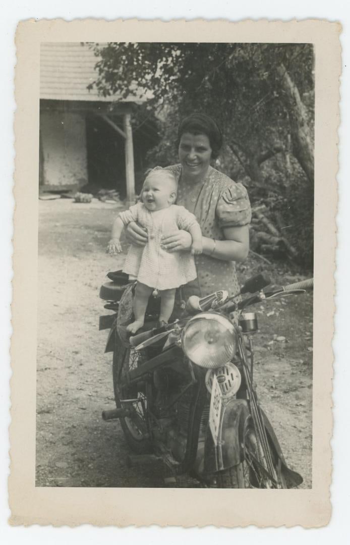Mother Posing Baby on Motorcycle RPPC Postcard: Nice example.