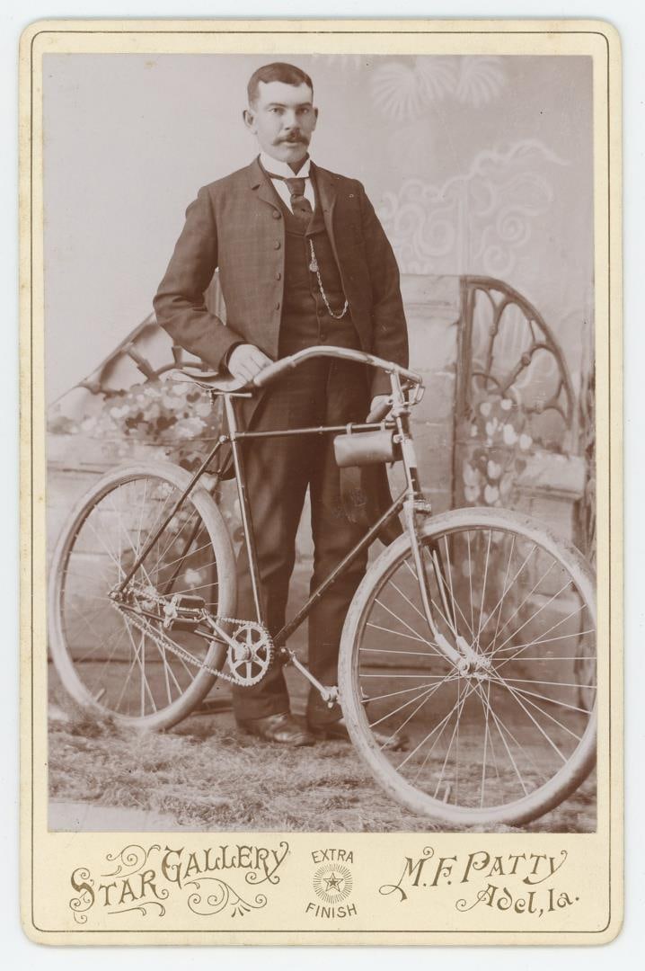 Iowa Man with Safety Bicycle Cabinet Photo (1 of 3)