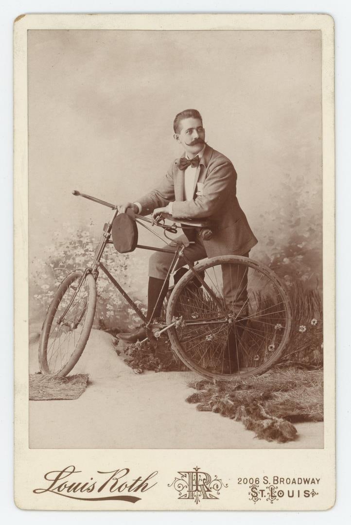 Missouri Man with Wood Rim Bicycle Cabinet Photo (1 of 3)