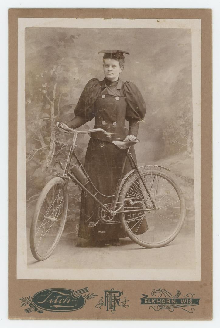 Wisconsin Lady with Bicycle Cabinet Photo (1 of 3)