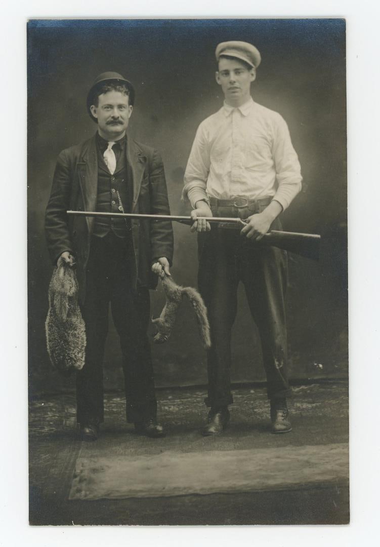 Squirrel and Badger Hunter RPPC Postcard: Nice image.