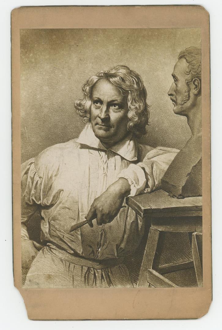 Bertel Thorvaldsen Modelling CDV Photo: Thorvaslden is seen modelling with the bust of Vernet. Vernet was the director of the French Academy in Rome when he painted his friend Thorvaldsen. The sculptor is seen in his working smock and with