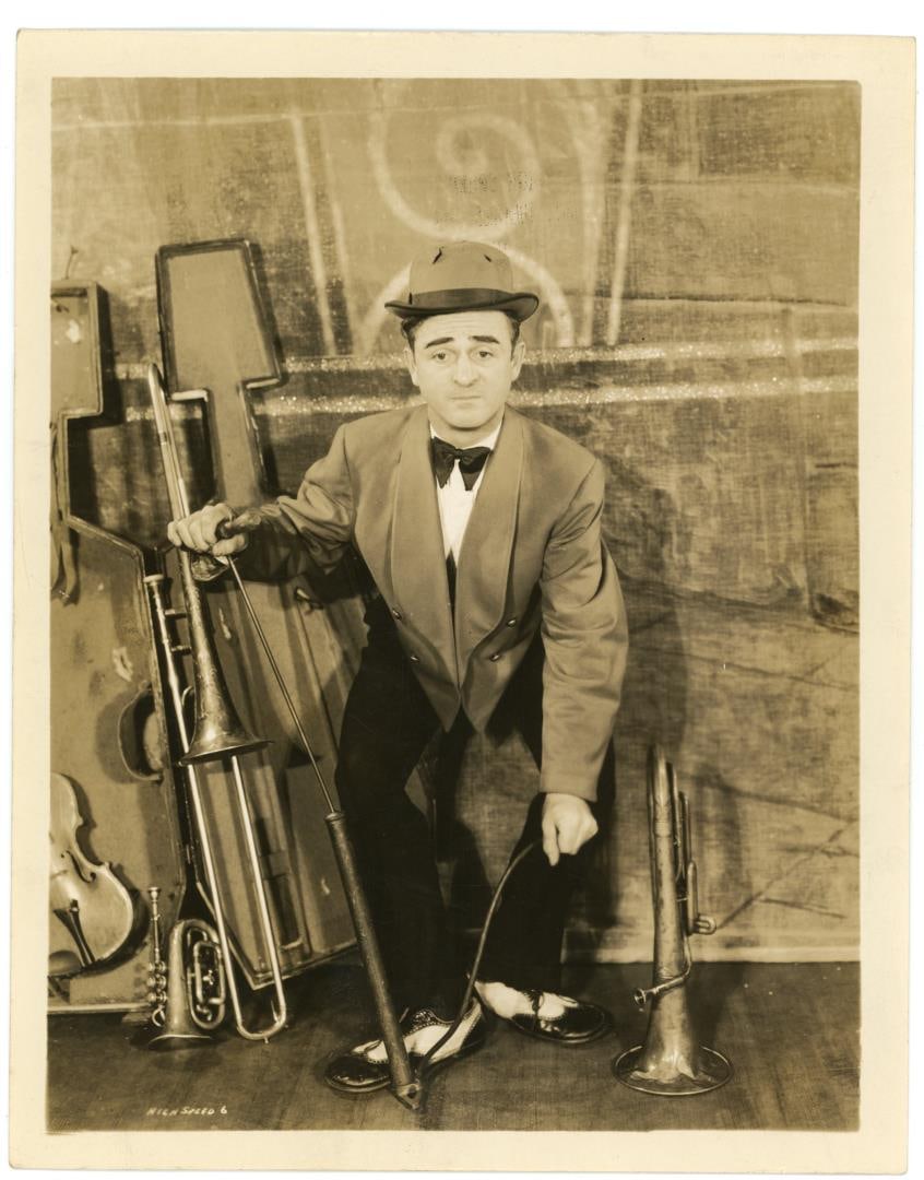 Wilbur Hall Playing a Tire Pump Photo (1 of 3)