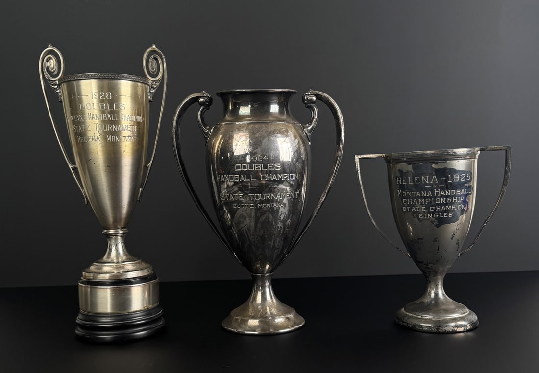 Montana Handball Trophy Cups: Largest is 4" by 12 3/4".
