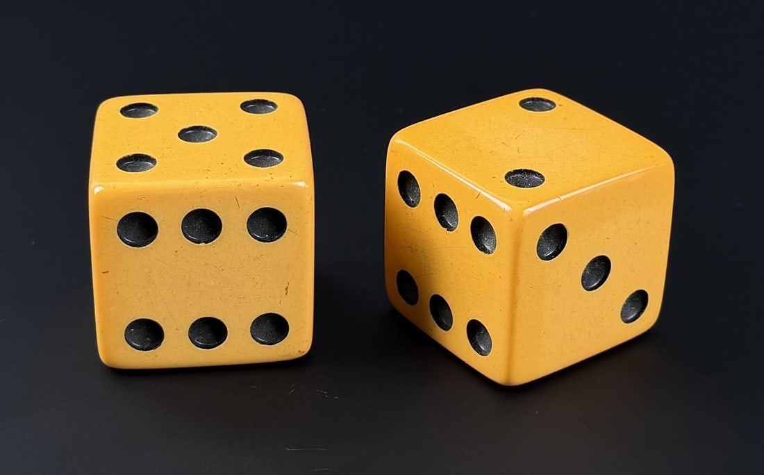 Oversize Yellow Lucite Dice: 1 1/2" diameter.