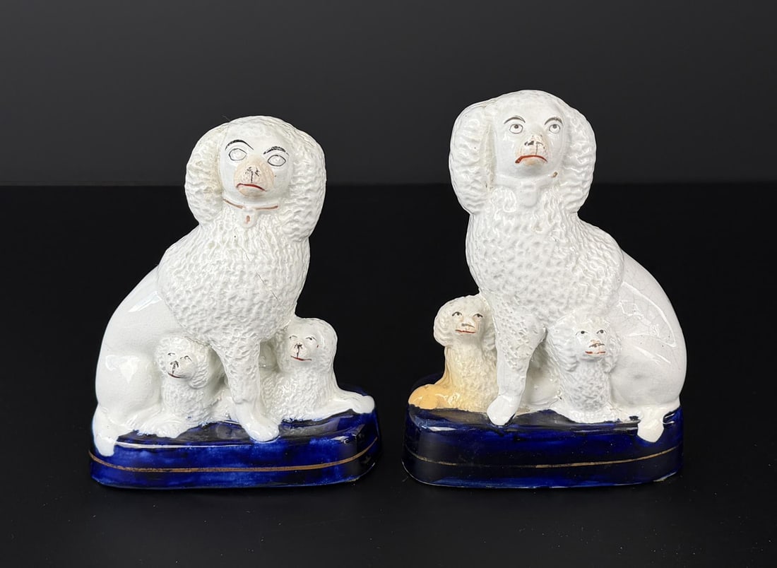 Staffordshire Poodles and Puppies Dogs: 6 1/4" by 4 7/8" by 2 7/8". One appears to have damage and has been repaired.