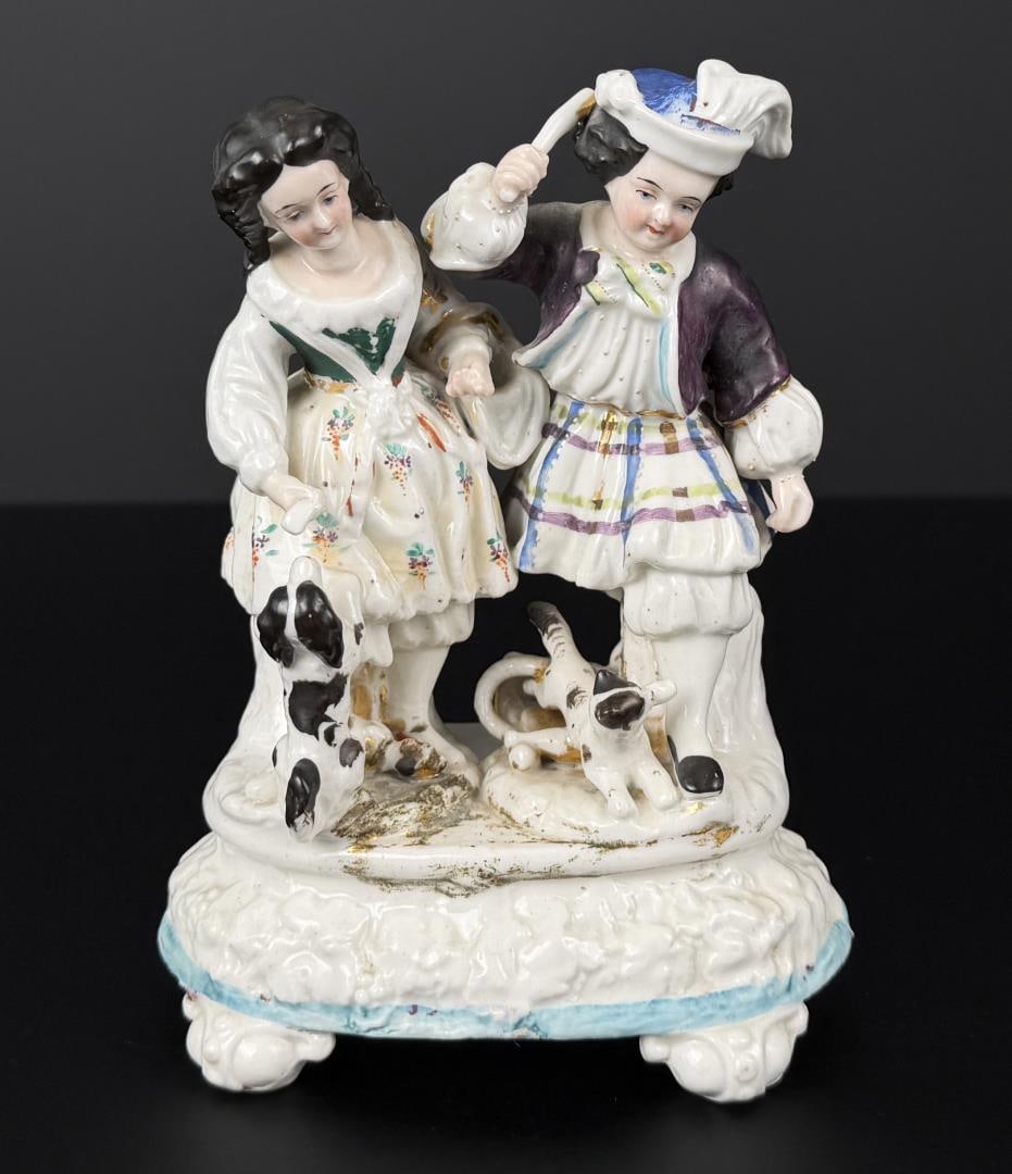Staffordshire Children and Dog Figurine: 8 7/8" by 7 1/4" by 4 1/2".