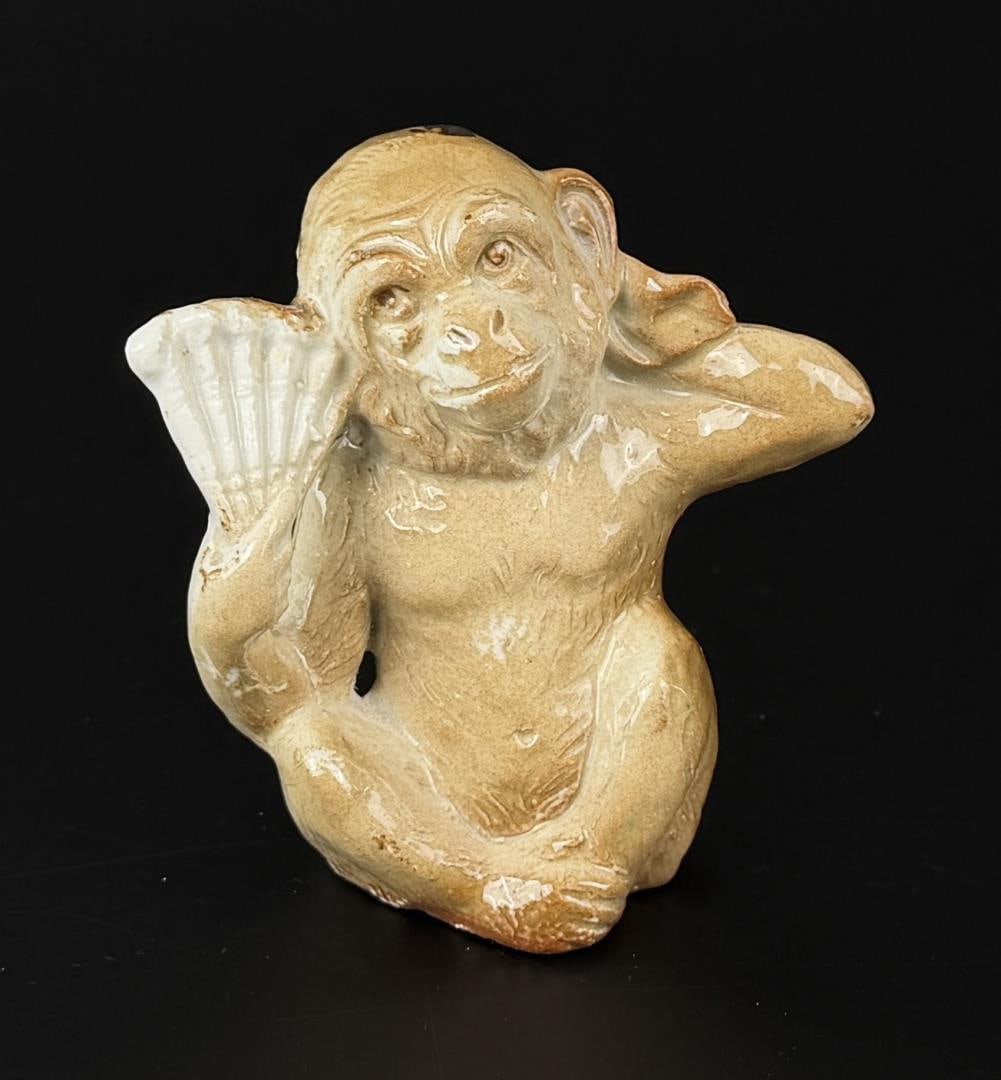 Schafer & Vater German Porcelain Monkey: 3" by 2 7/8" by 1 7/8".