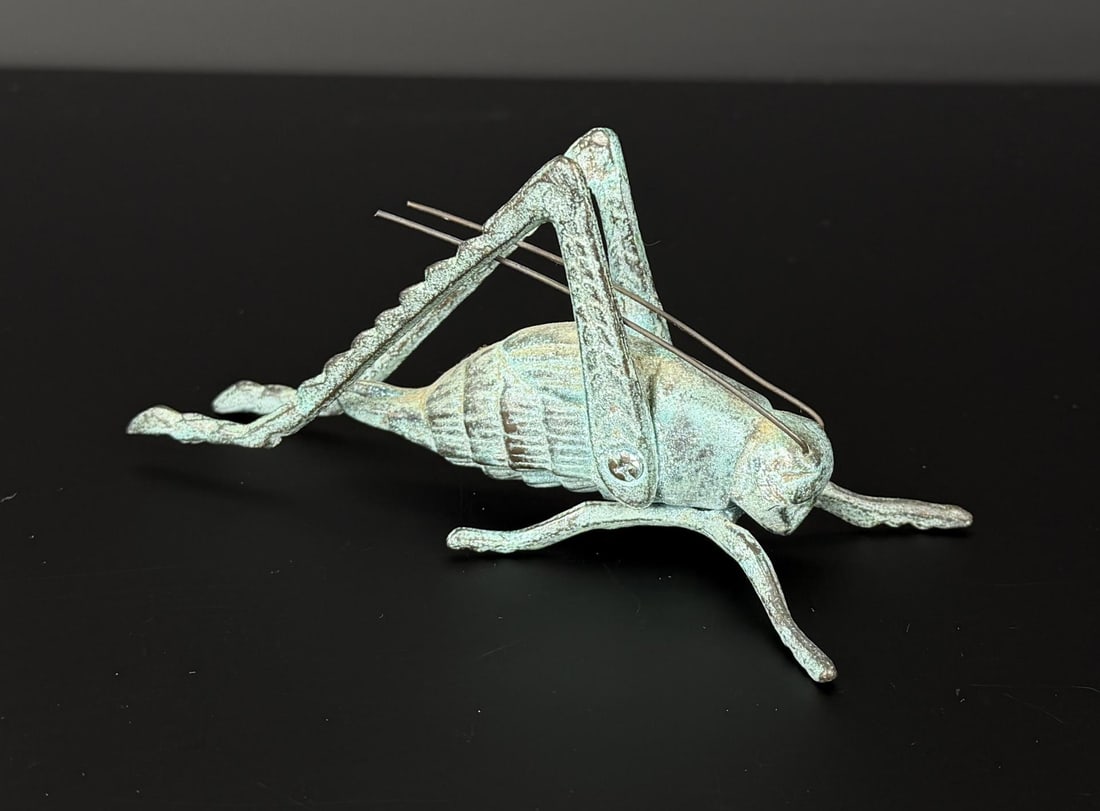 Cast Iron Grasshopper Paperweight: 5 7/8" by 2 7/8" by 2 1/4".