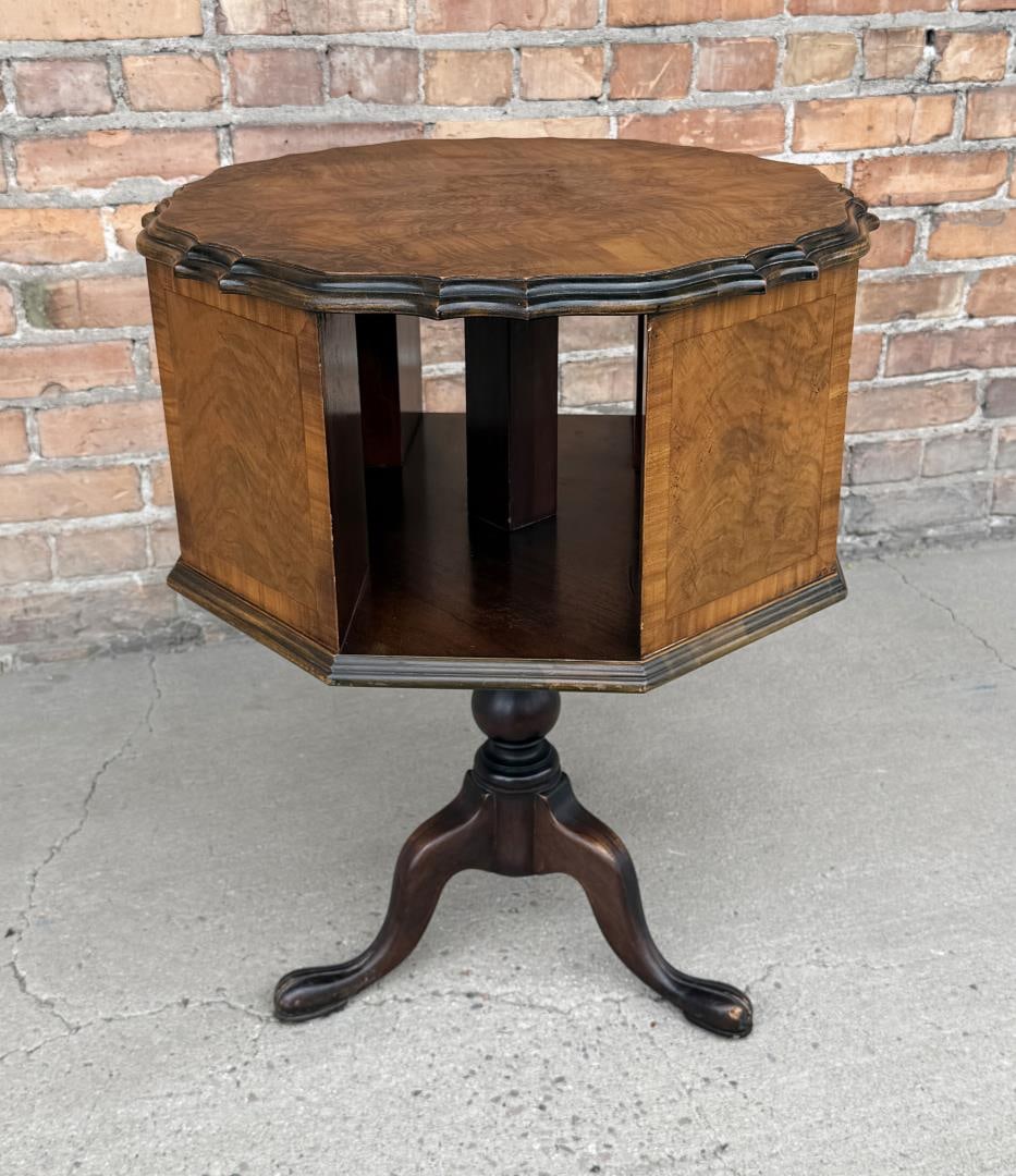 1920s Revolving Drum Book Table: 21" wide and 26 1/2" tall. Main revolving body with 4 openings, resting on a single pedestal with cabriole legs and pad feet.