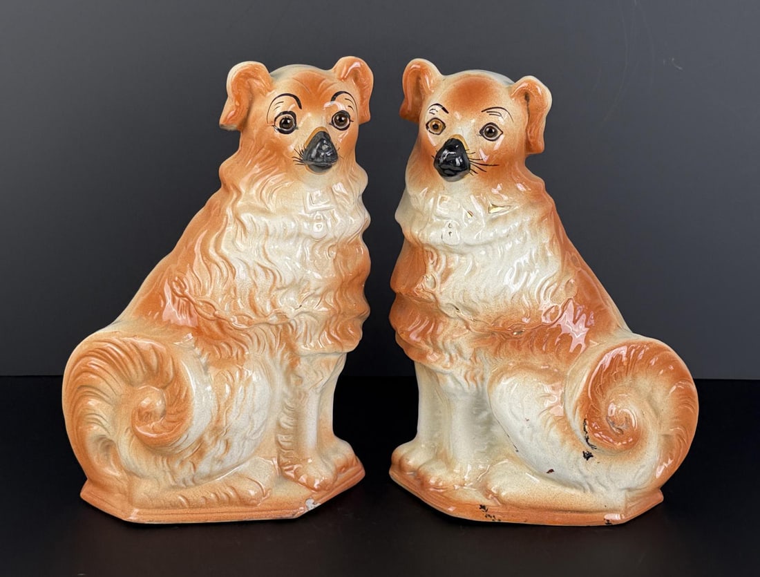 Pair of Large Staffordshire Dogs: 12 7/8" by 8 7/8" by 5 1/2". Damage to one foot and nose as shown.